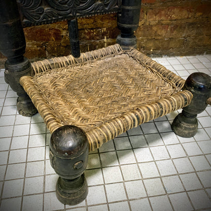 Low antique Indian chair