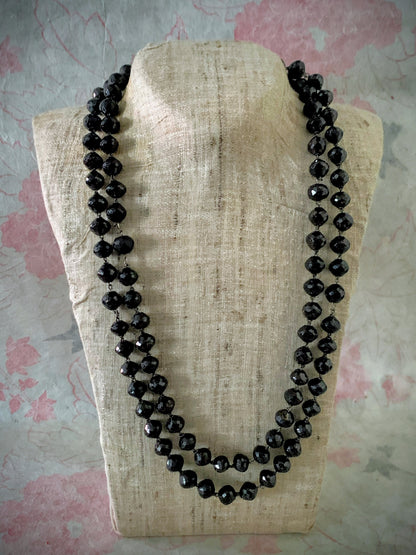 An antique faceted garnet necklace