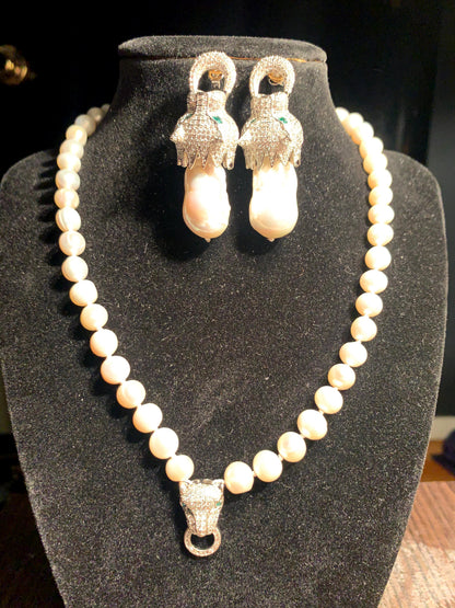 A Panther ear ring and necklace