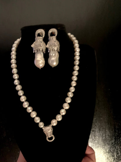 A Panther ear ring and necklace