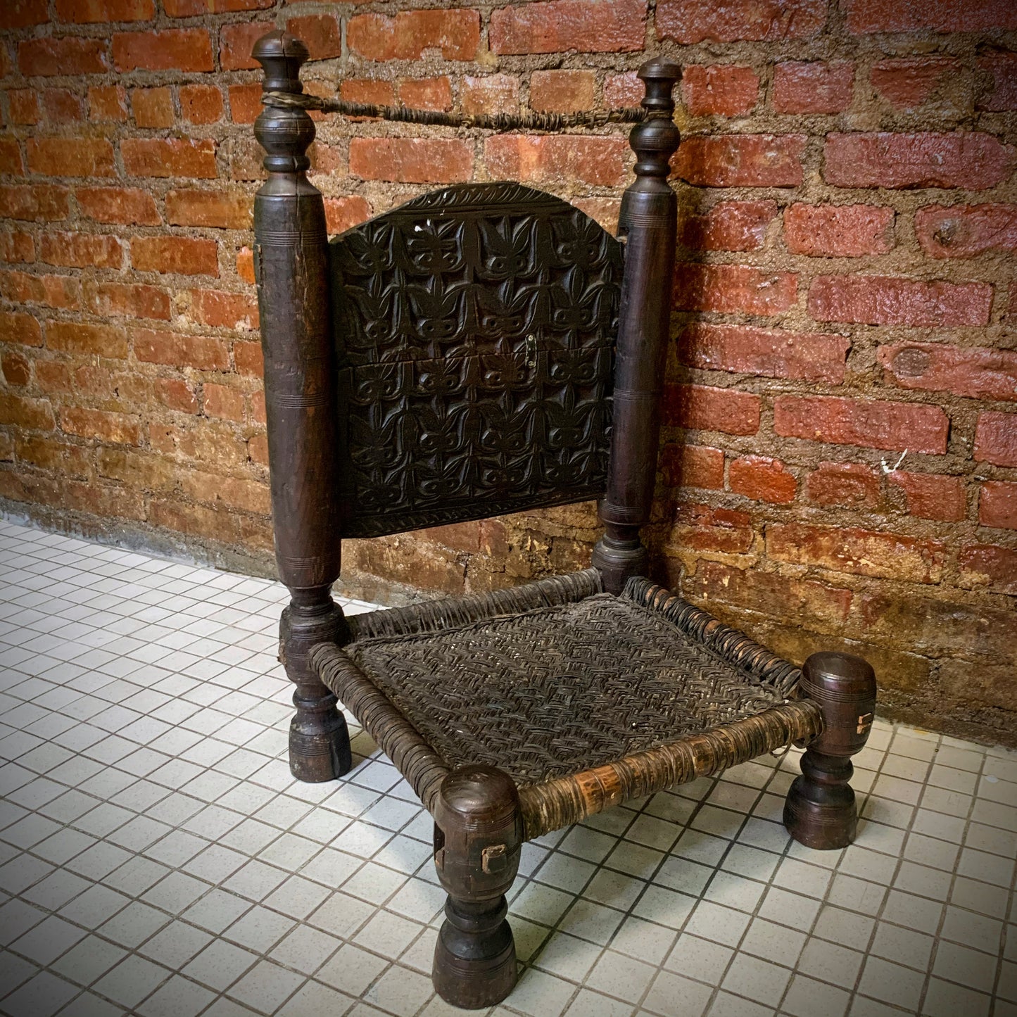 Low antique Indian chair