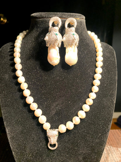 A Panther ear ring and necklace