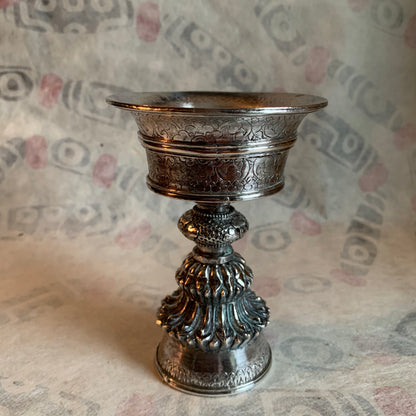 A silver Tibetan butterlamp