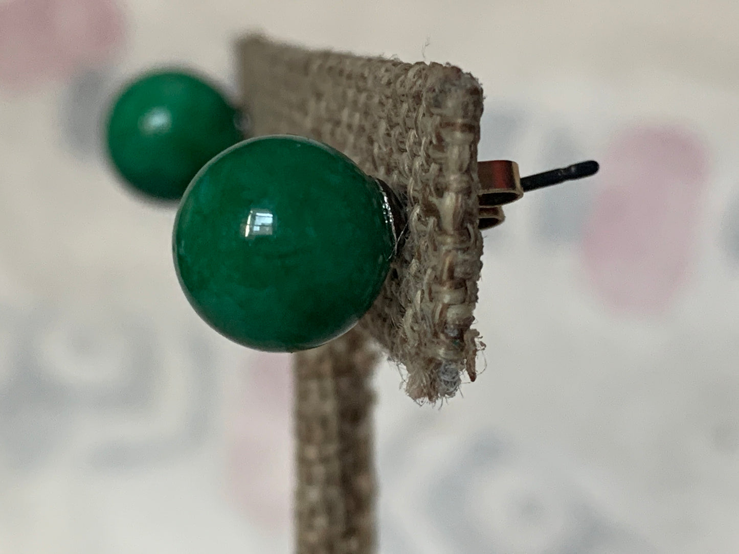 A pair of jade stud earrings