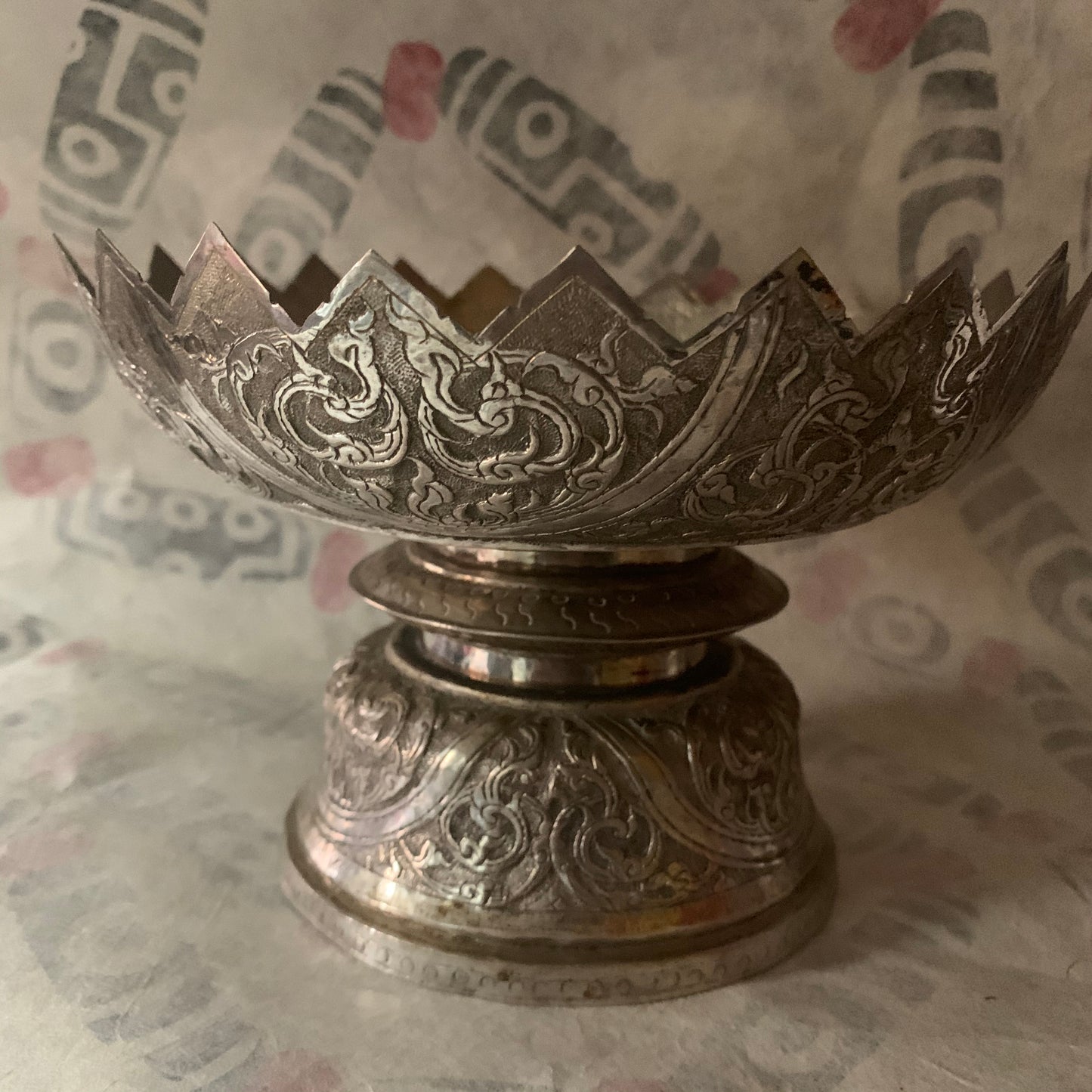 An antique silver fruit bowl stand