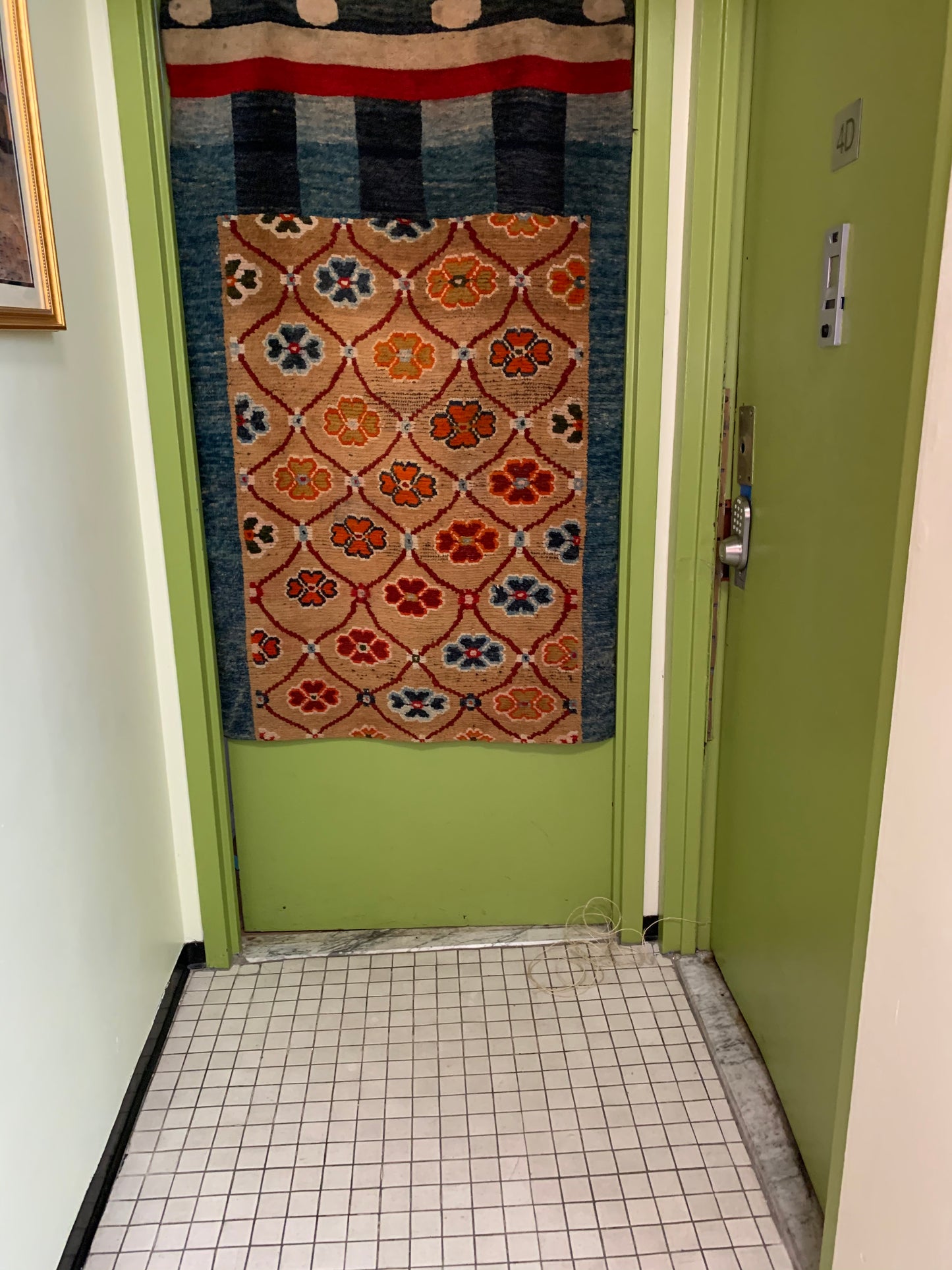 An antique Tibetan door curtain rug