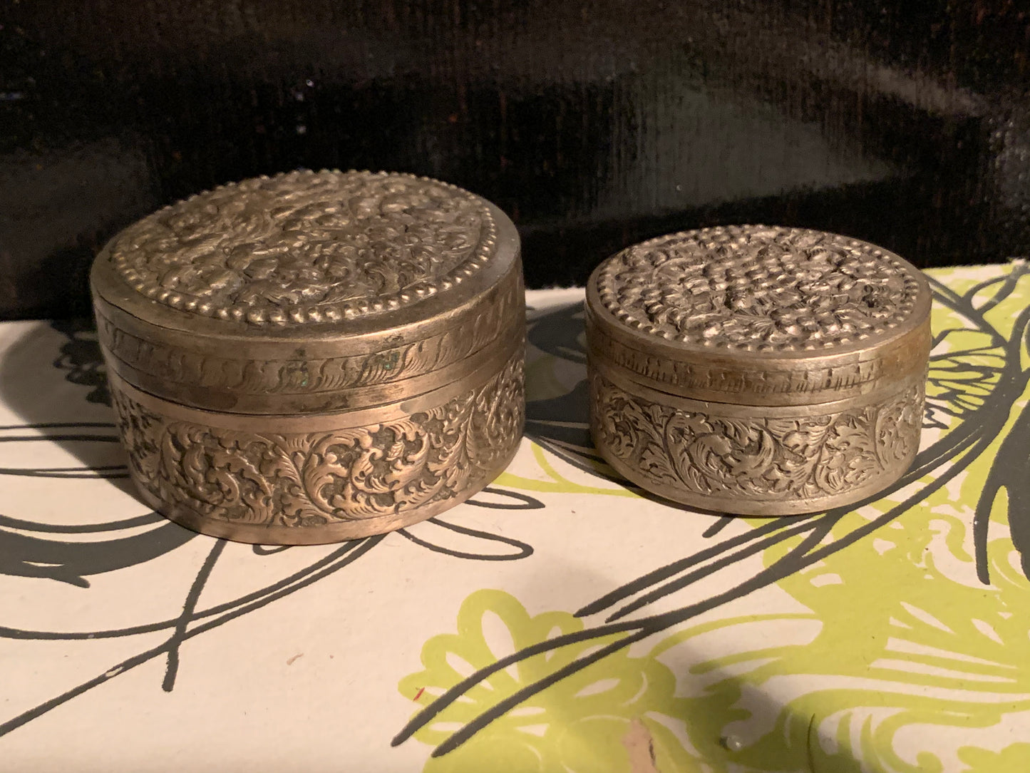 Two metal pill boxes