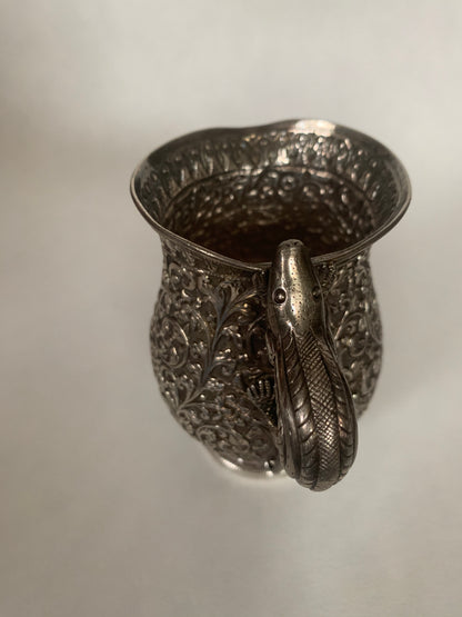 A silver creamer