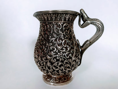 A silver creamer