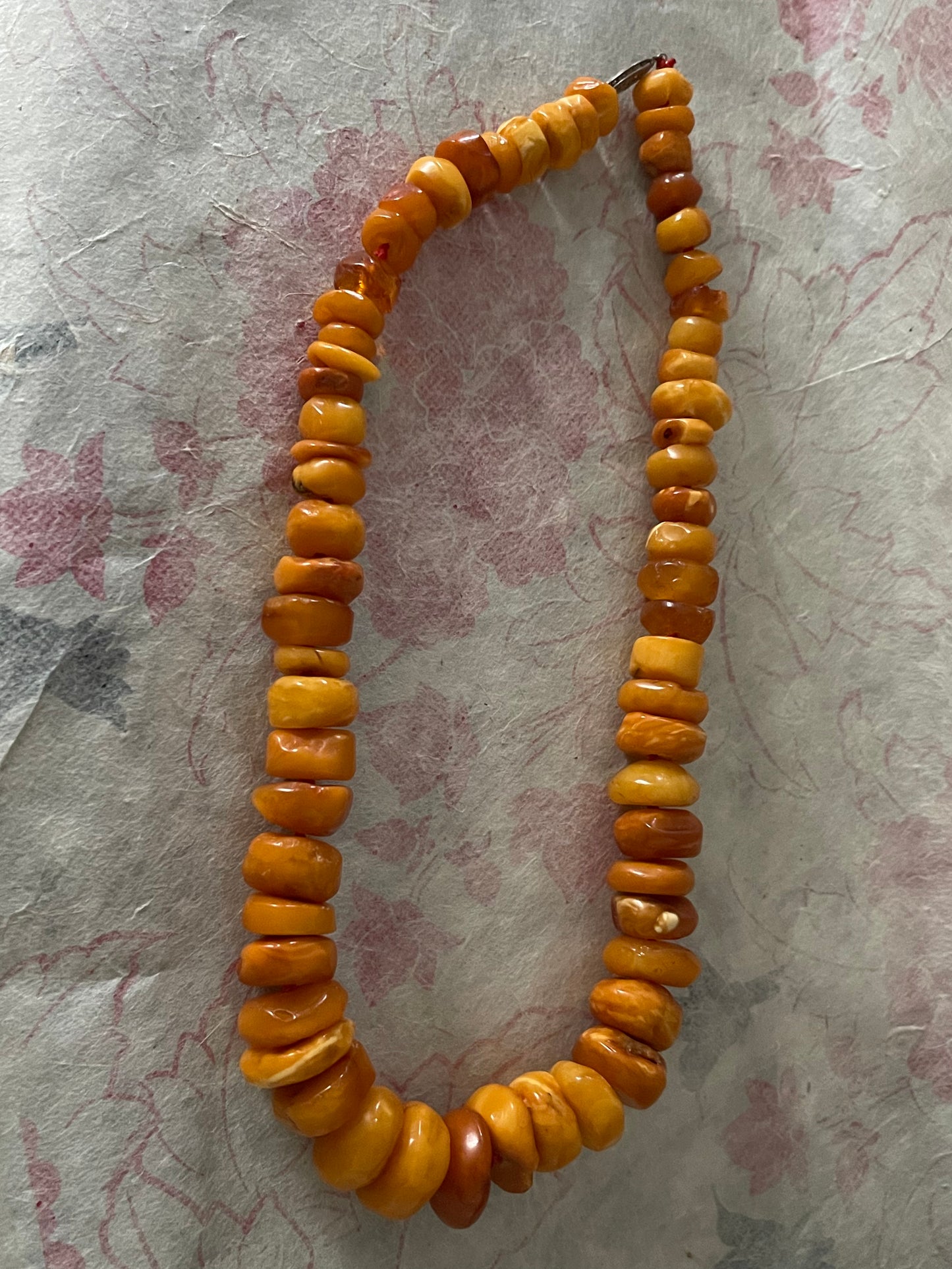 A vintage butterscotch amber bead necklace