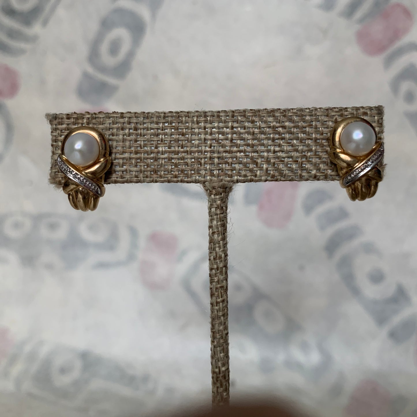 A pair of vintage pearl earrings