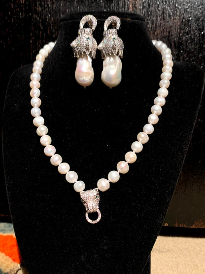 A Panther ear ring and necklace