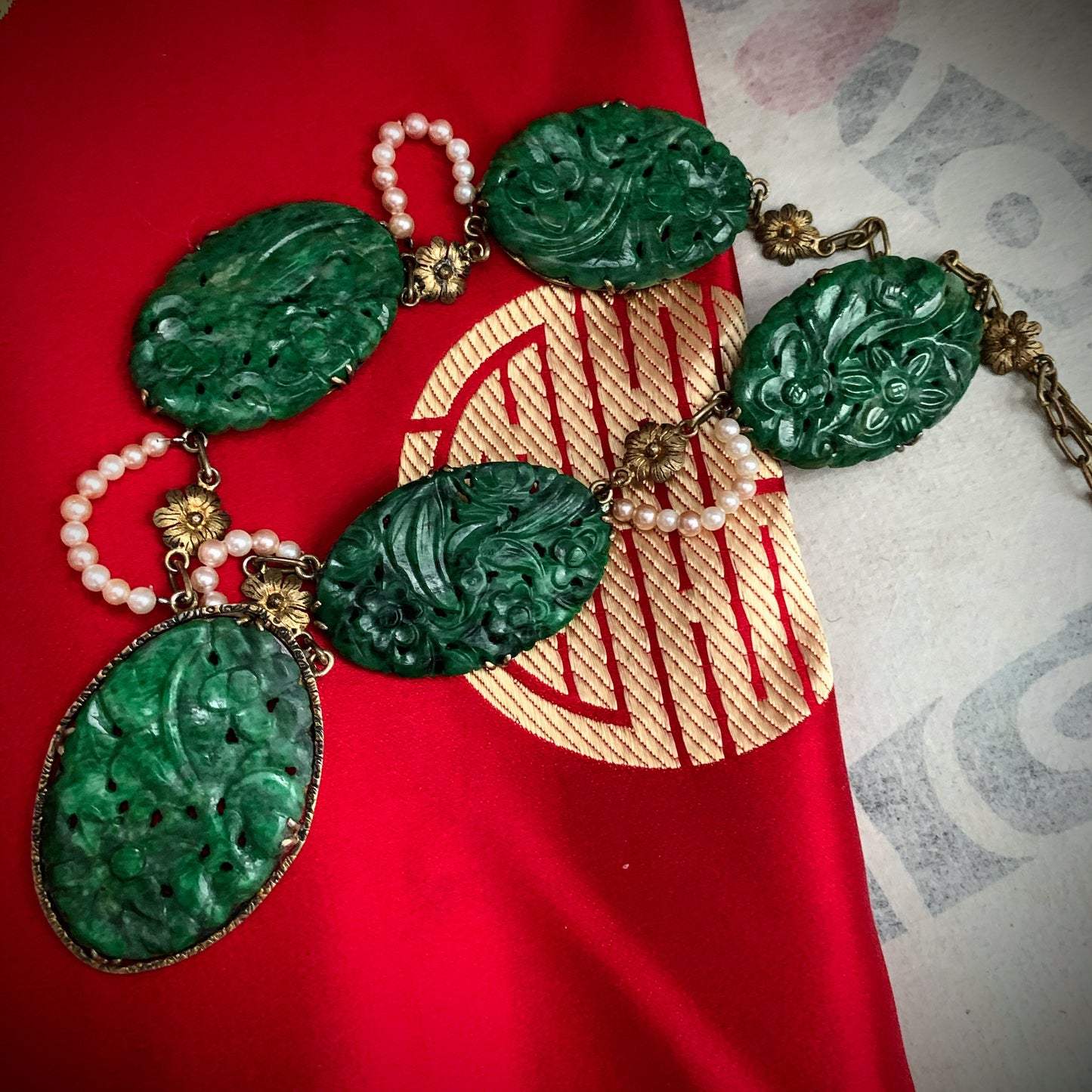 A spinach green jade necklace