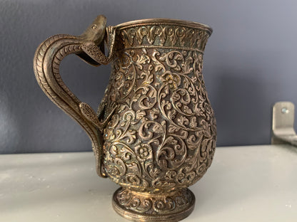 A silver creamer