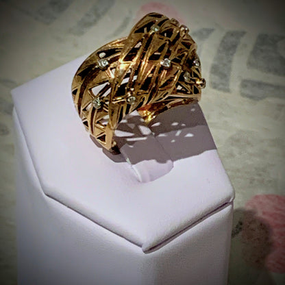 An 18k gold and diamond ring