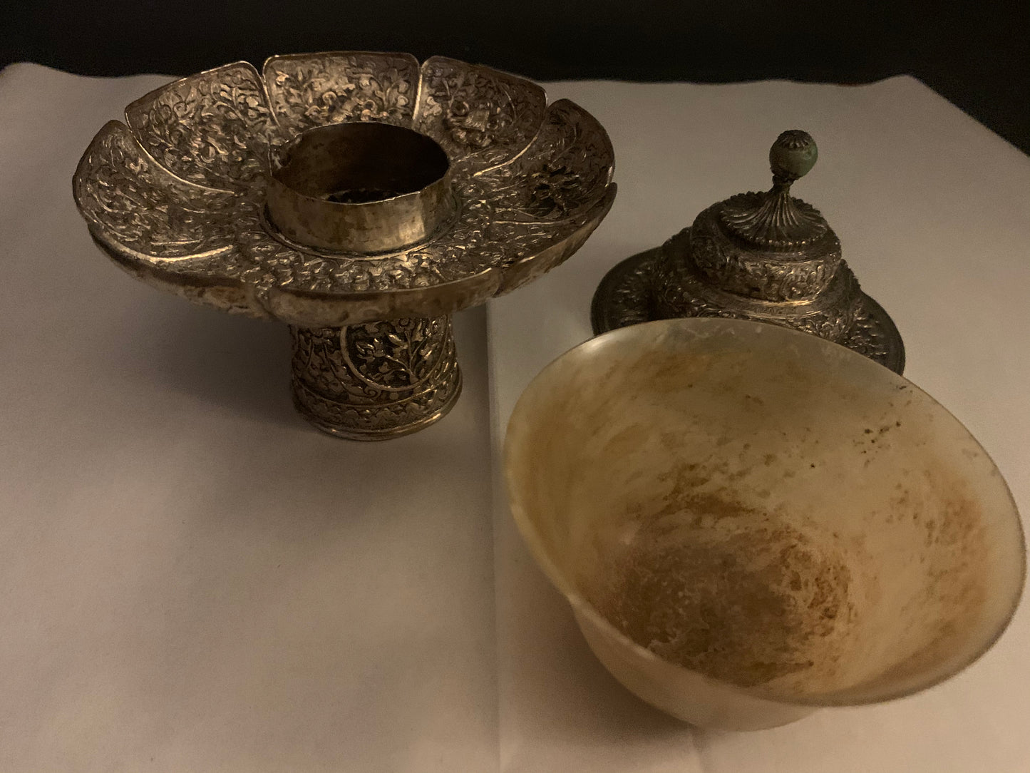 A silver Tibetan cup stand