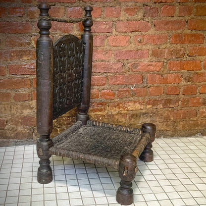 Low antique Indian chair