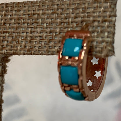 A pair of turquoise hoop earrings