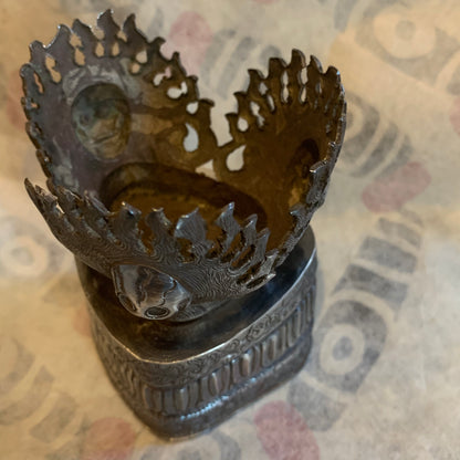 An antique silver kapala stand and cover