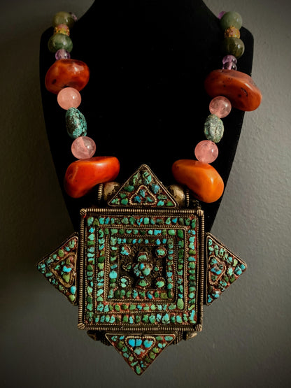 A vintage Tibetan ghau necklace