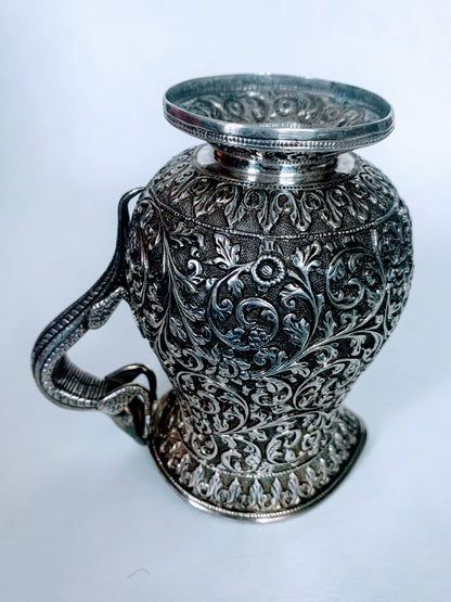 A silver creamer