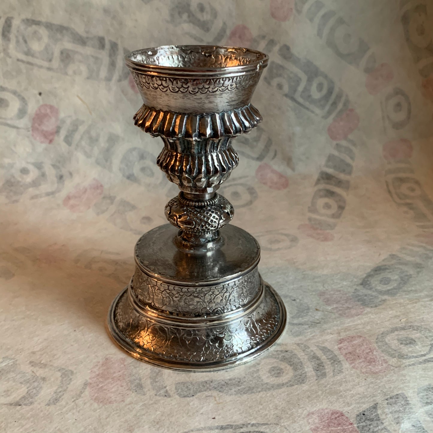 A silver Tibetan butterlamp
