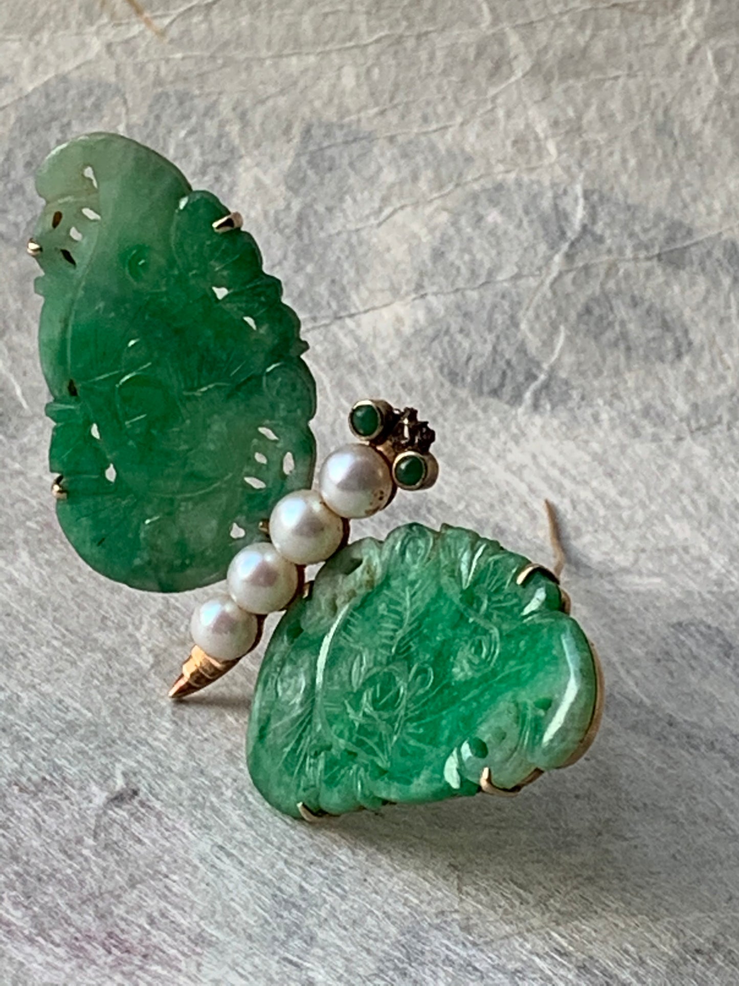 A vintage jade butterfly brooch