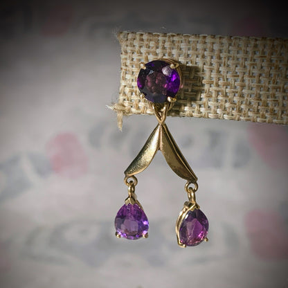 A pair of amethyst gold earrings