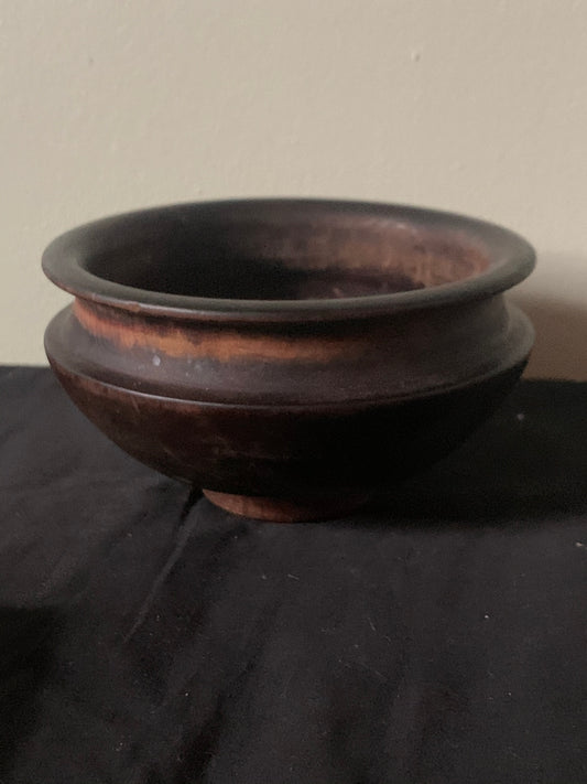 A vintage Tibetan wooden bowl