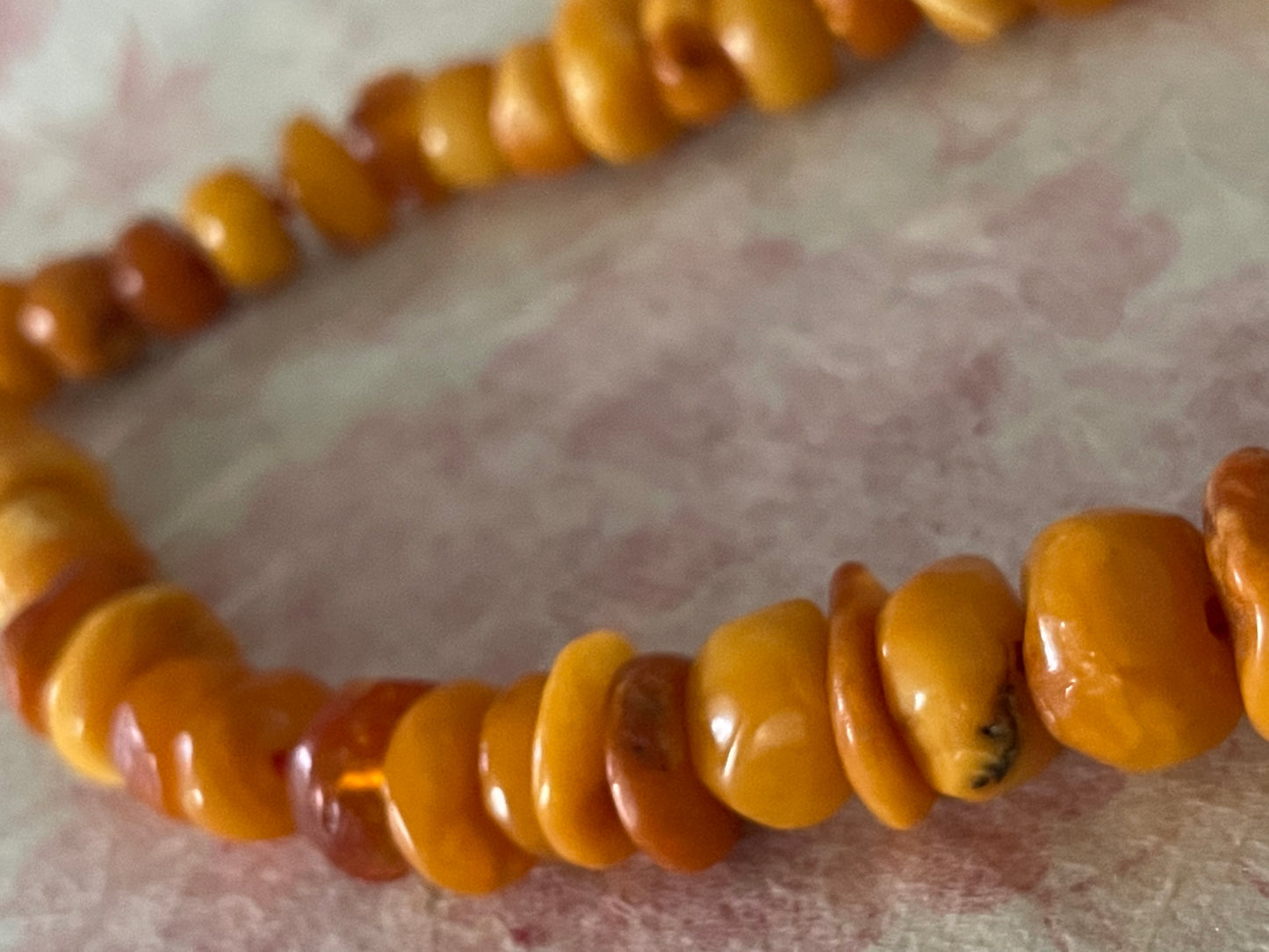 A vintage butterscotch amber bead necklace