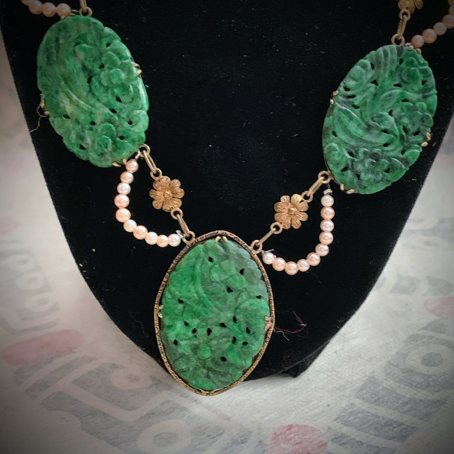 A spinach green jade necklace