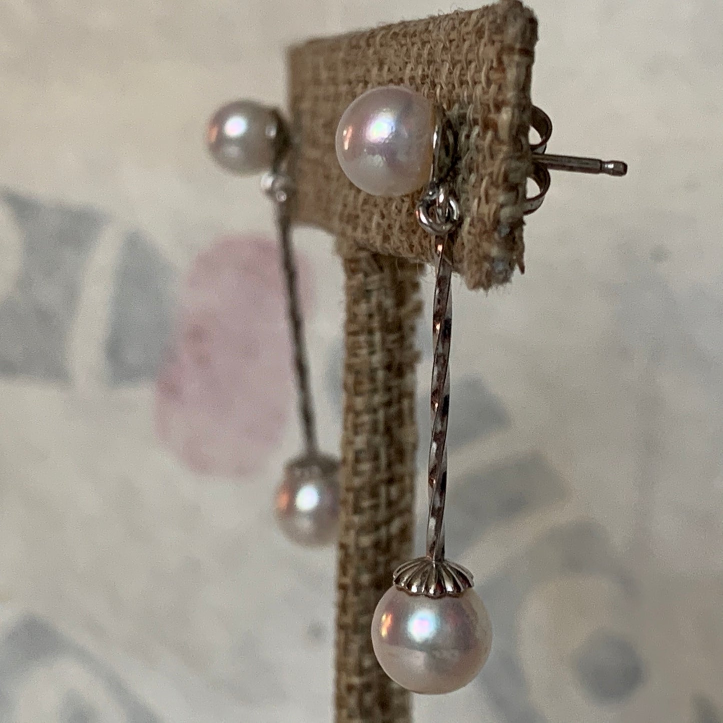 A pair of pearl dangling earrings