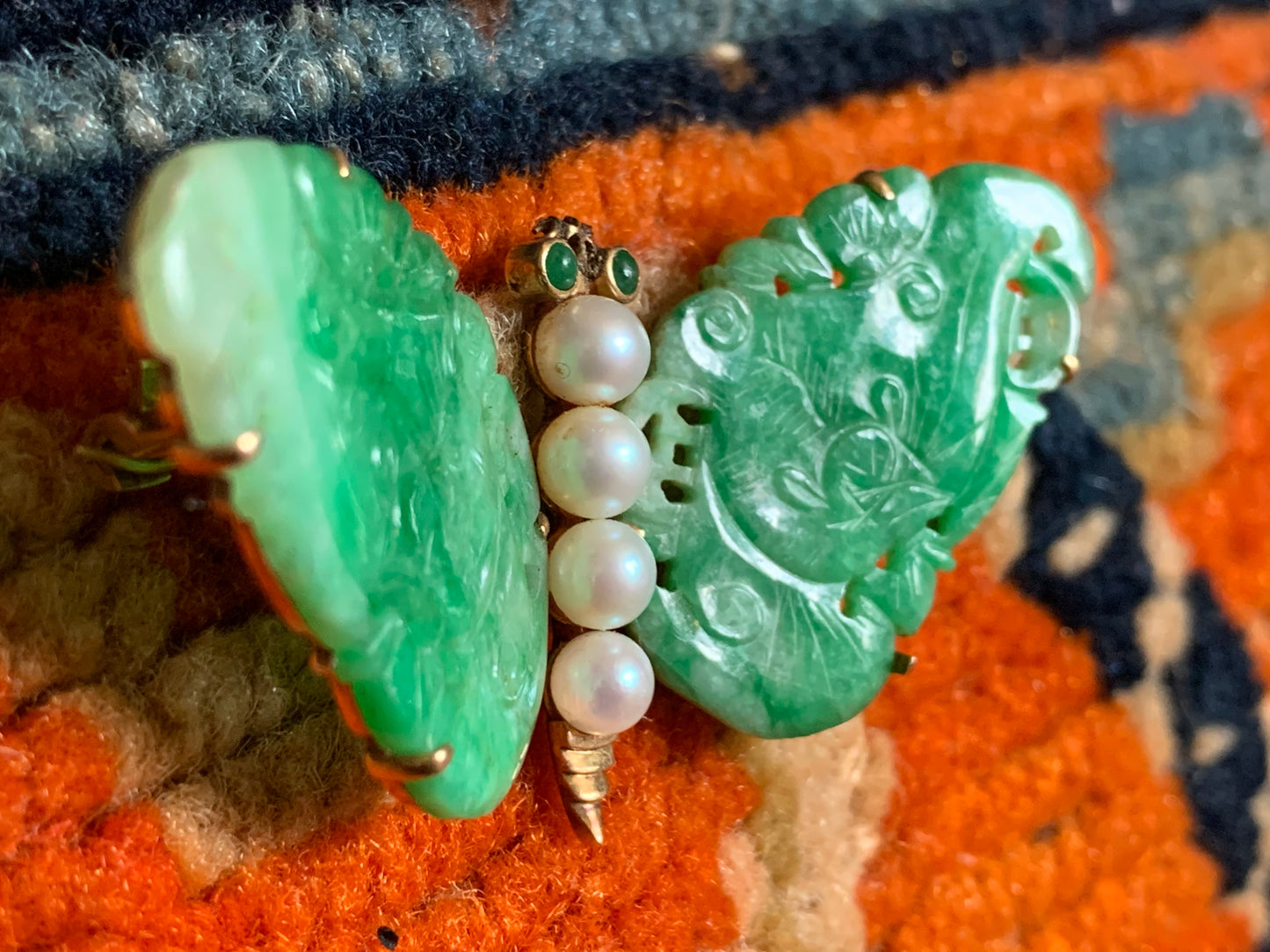 A vintage jade butterfly brooch