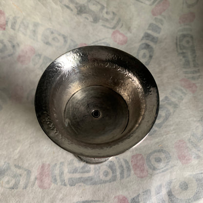 A silver Tibetan butterlamp