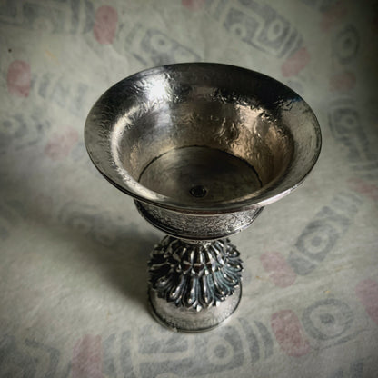 A silver Tibetan butterlamp