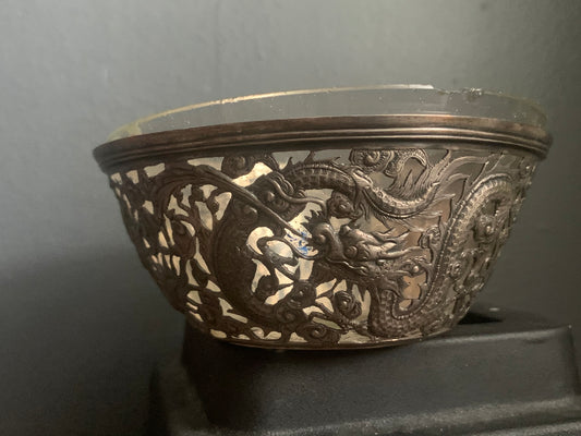 A silver bowl sleeve