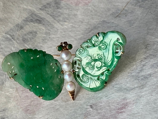 A vintage jade butterfly brooch