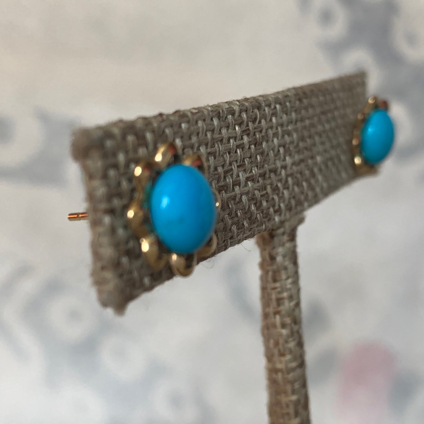 A pair of turquoise earrings in 14kt setting