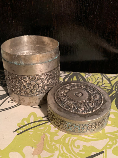 A cylindrical metal box