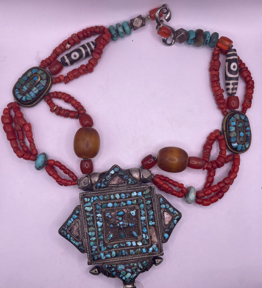 Antique ghau with coral and silver bead necklace