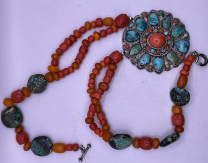 Coral, amber and turquoise necklace with a turquoise and coral silver pendant