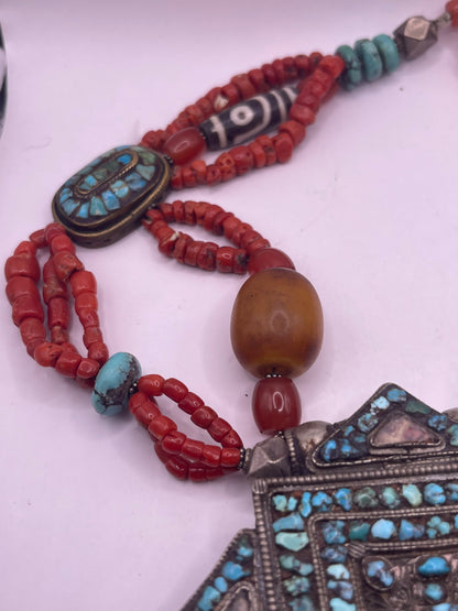 Antique ghau with coral and silver bead necklace