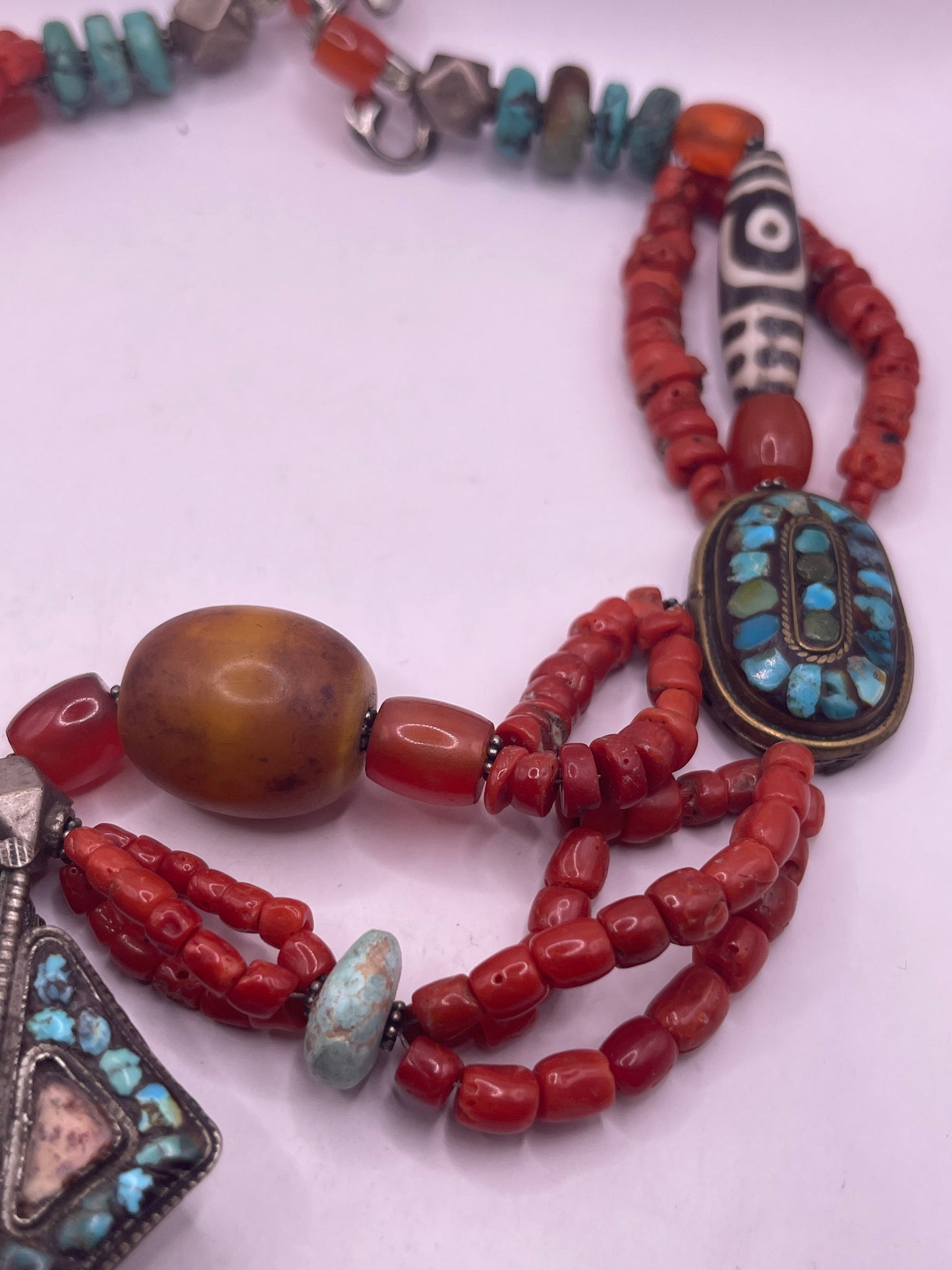 Antique ghau with coral and silver bead necklace