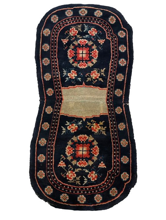 A vintage  Tibetan  indigo rounded woolen saddle rug