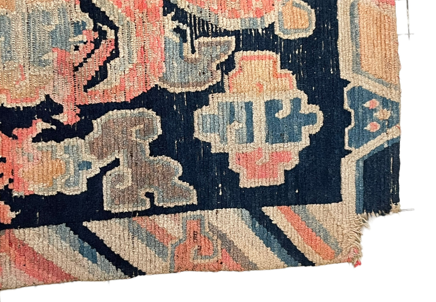 A 19th C., antique Tibetan dragon rug