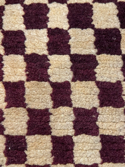 An antique Tibetan checkerboard handmade wool  rug