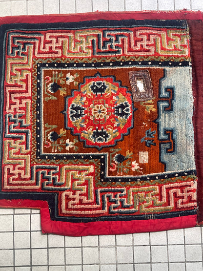 An antique Tibetan saddle rug