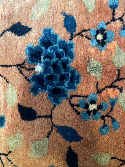 An antique handwoven Chinese rug