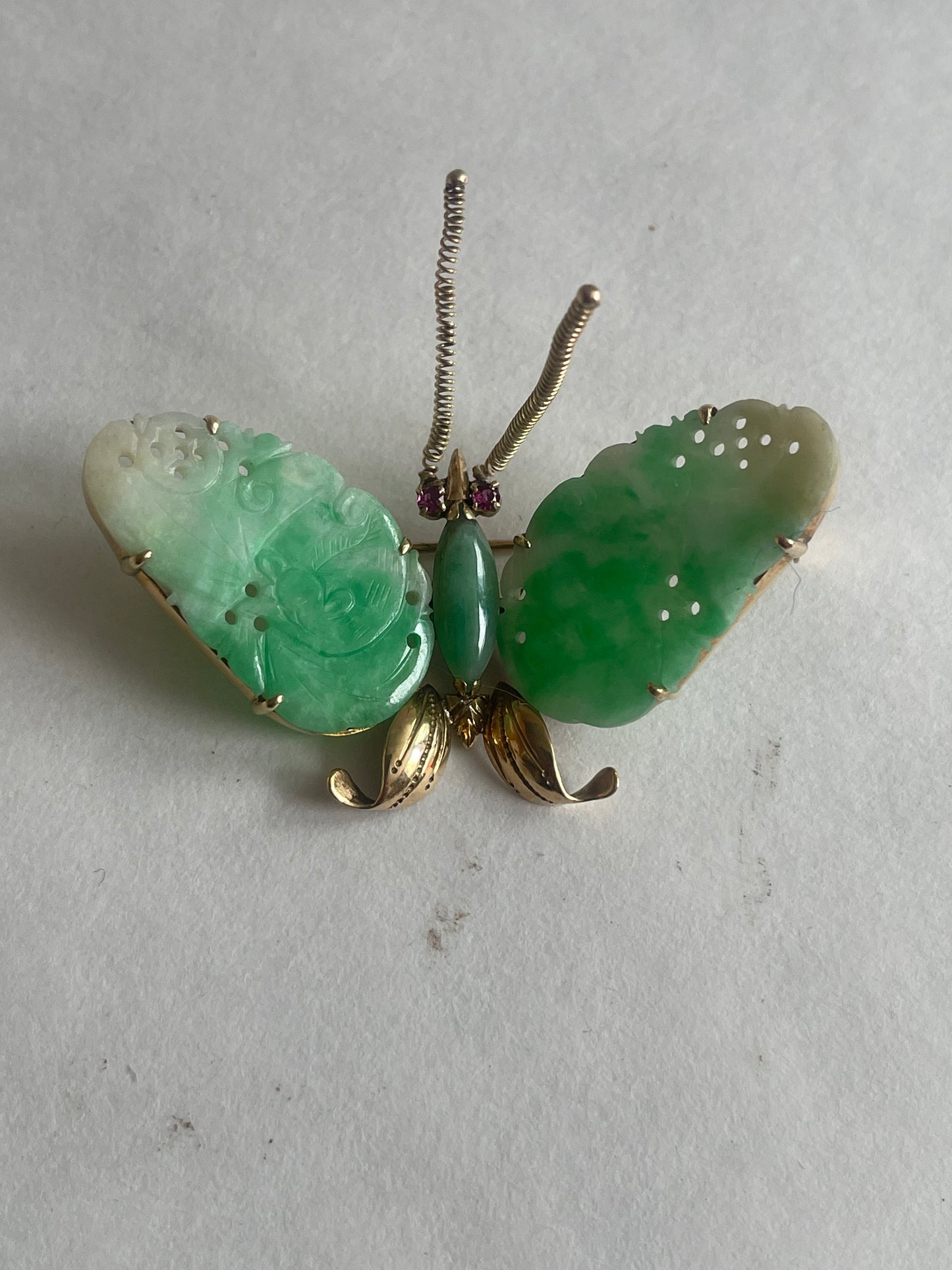 A vintage butterfly shaped brooch with jade and 14kt gold
