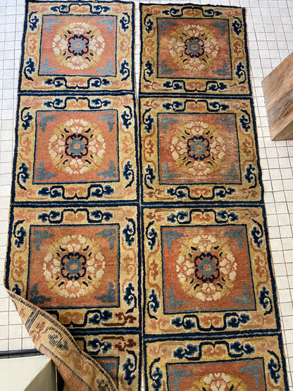 A pair of antique monastery runner carpets